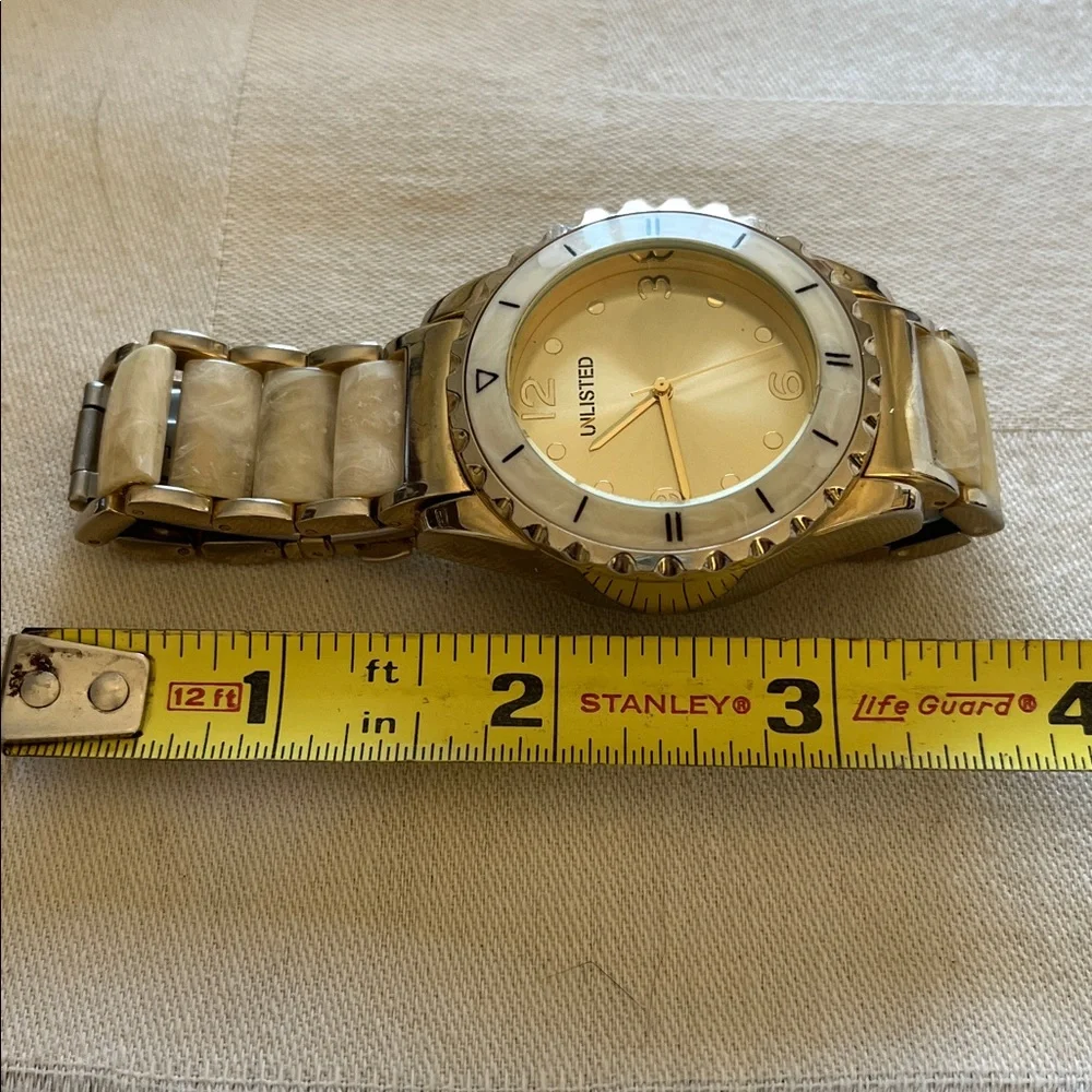 Unlisted by Kenneth Cole Gold-Tone Watch With A Mother-Of-Peal Bracelet Band